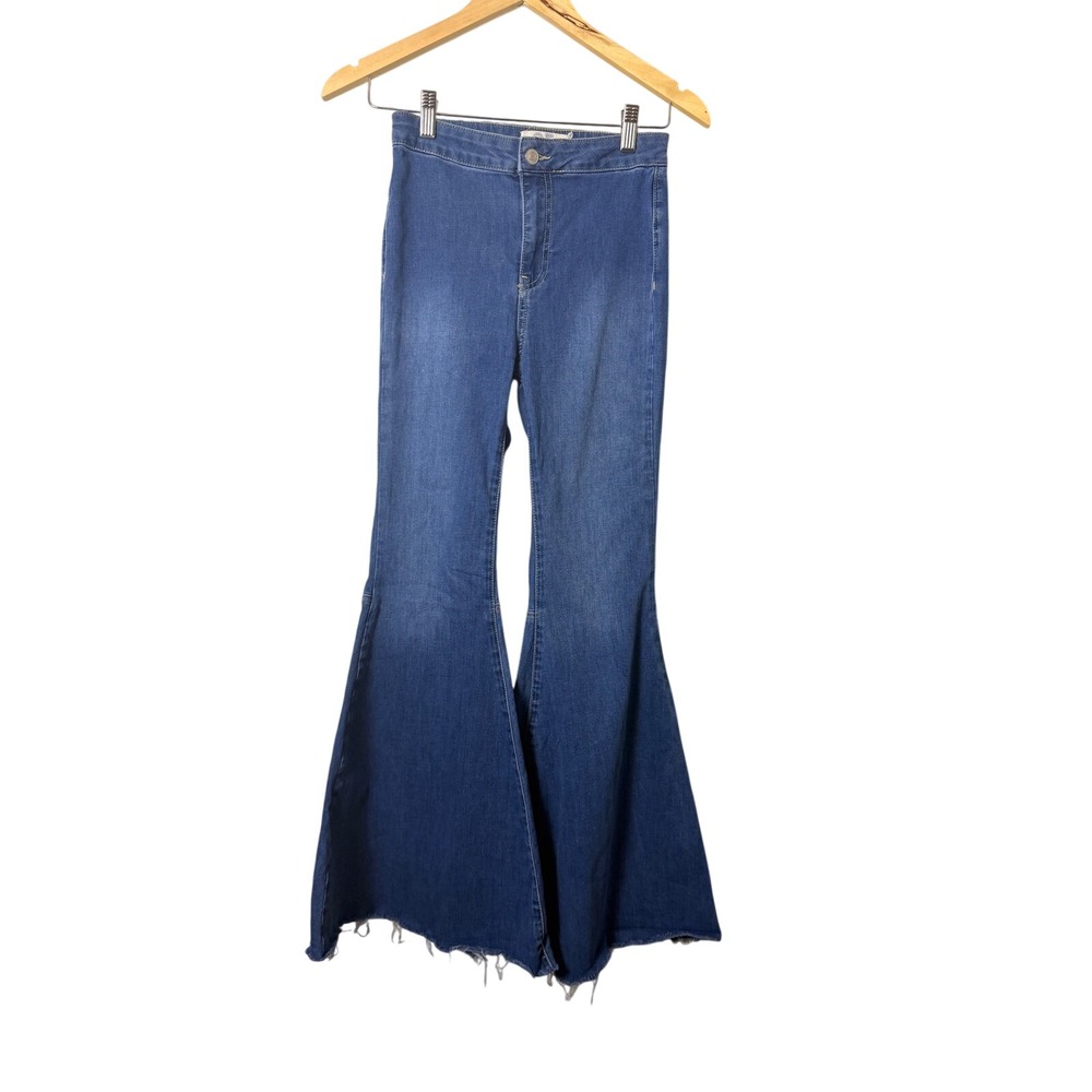 Free‎ People High Rise Flared Raw Hem Jeans